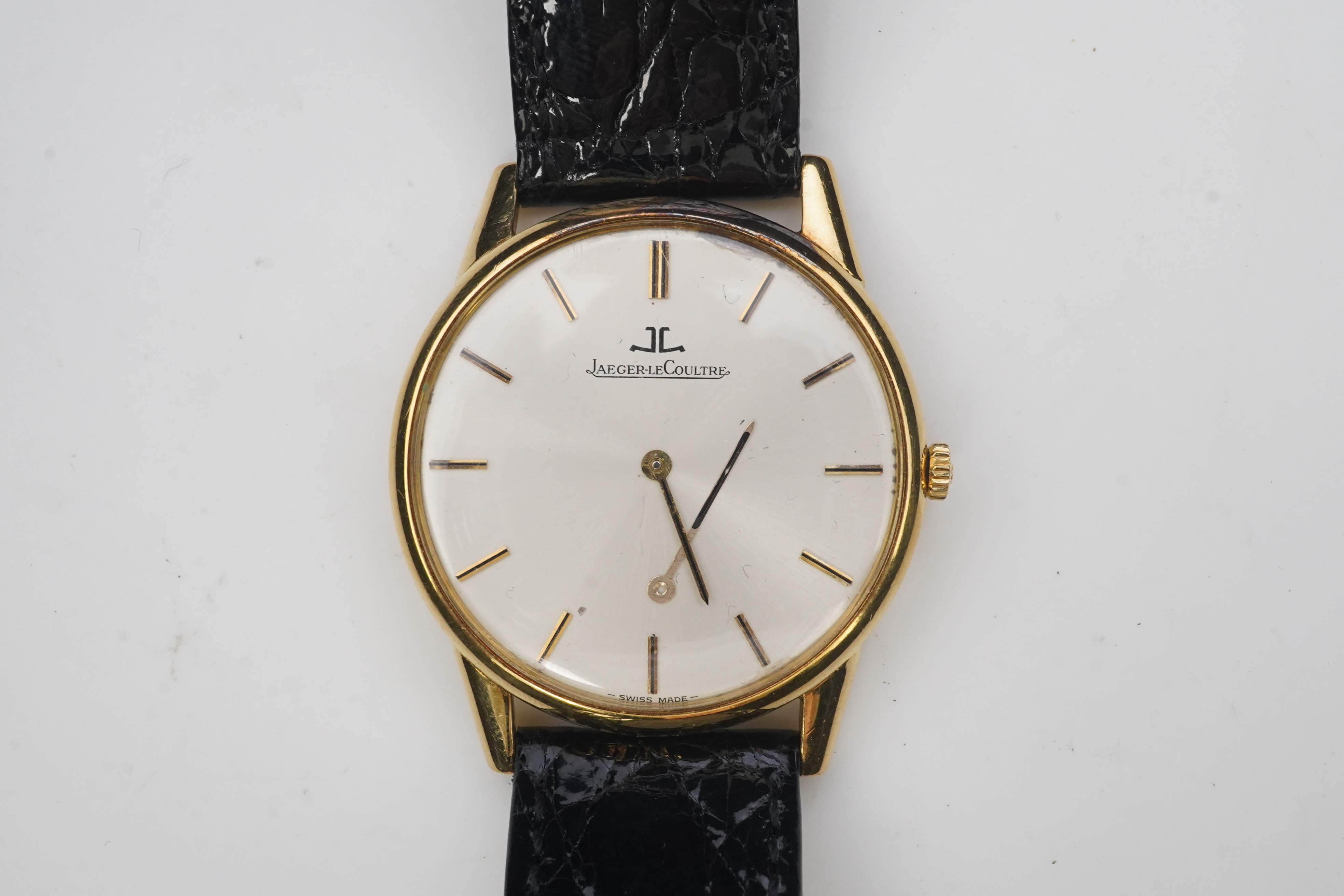 A gentleman's 18ct gold Jaeger LeCoultre manual wind dress wrist watch, on a later associated leather strap